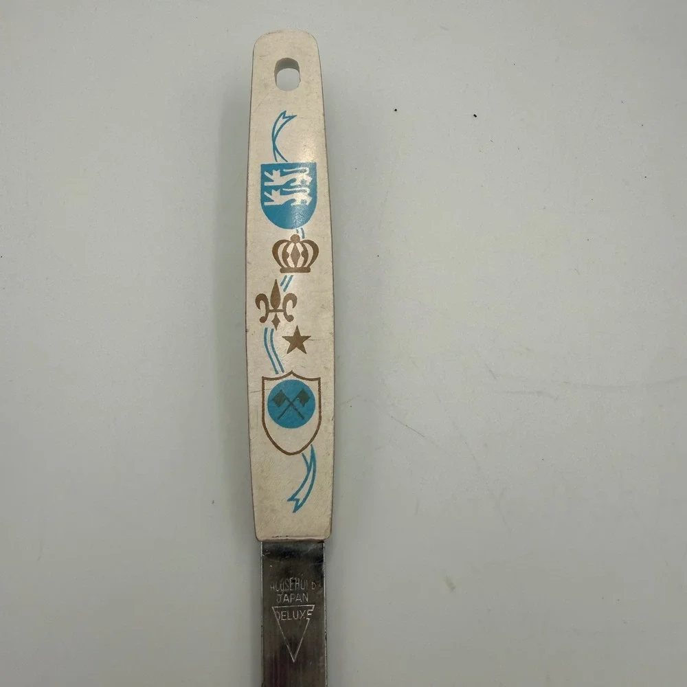 Vintage Household Japan Deluxe Spatula Heraldic Crest White Handle Stainless
